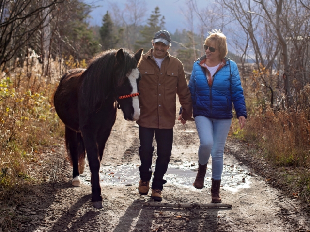 Frankie, Morley and Sherrylee Peckford out for a late fall walk around their property on Georges Bay, N.L.  Photo: Alyssa Gillingham