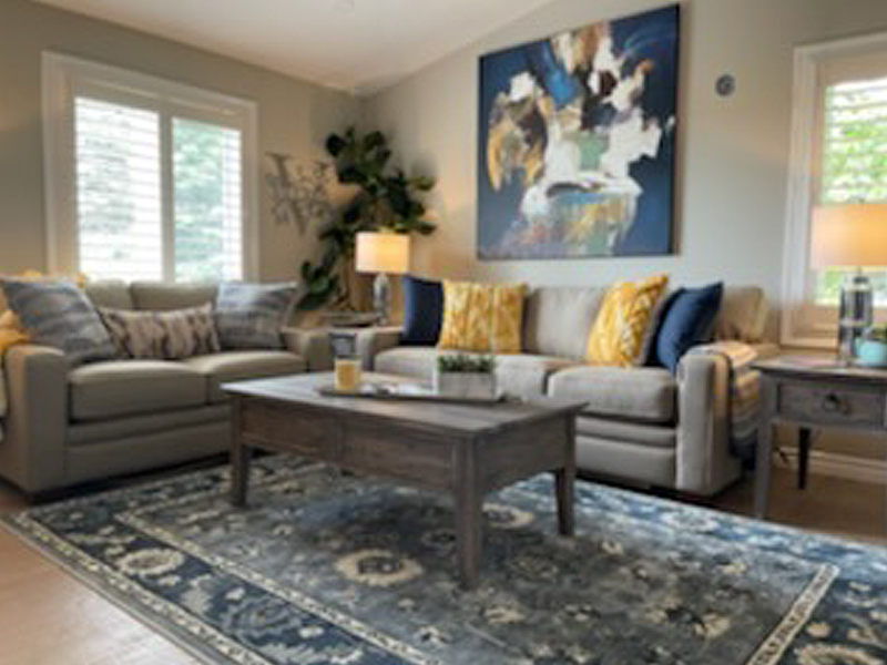 Living room with Blue and yellow decor  Photo: Damien Packwood